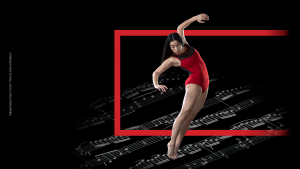 dancer wearing red leotard with music notes in background