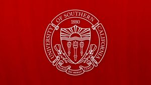 white USC seal on cardinal background