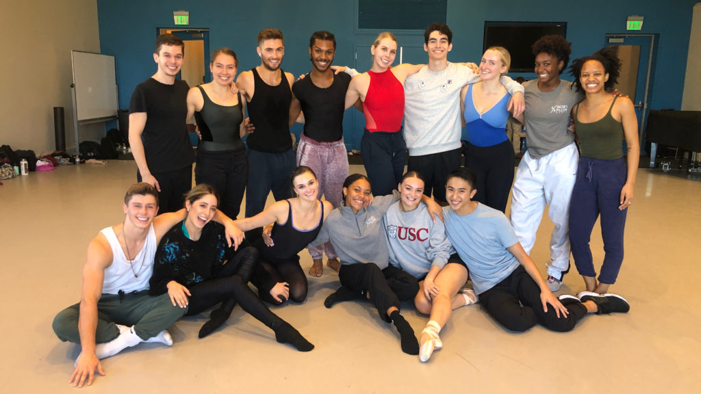 Class of 2020 smiling in a dance studio