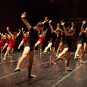 Dancers wearing red and black