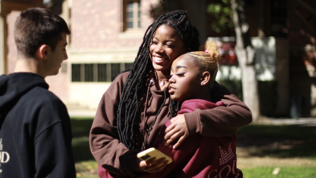 two girls hugging