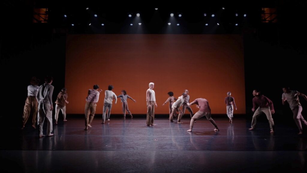 dancers dressed in neutral colors perform Doug Varone choreograhy on stage
