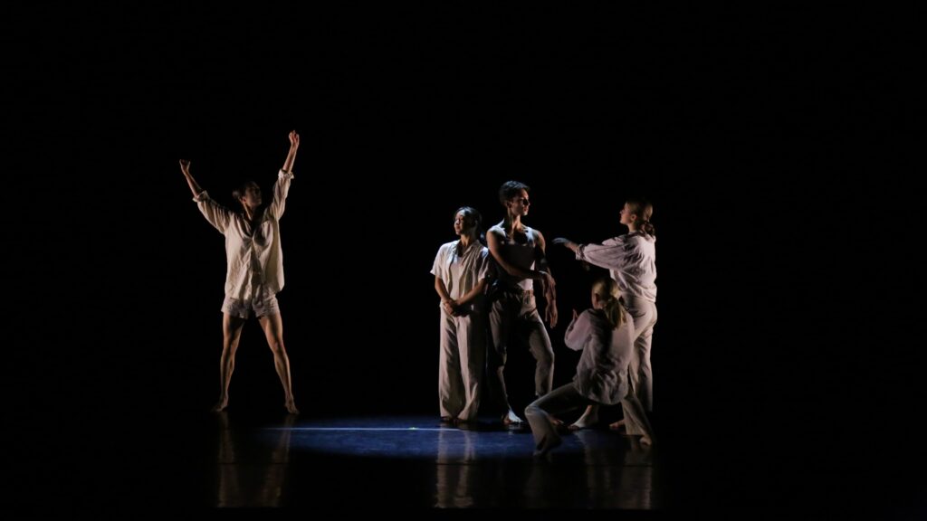 dancers on stage during a performance