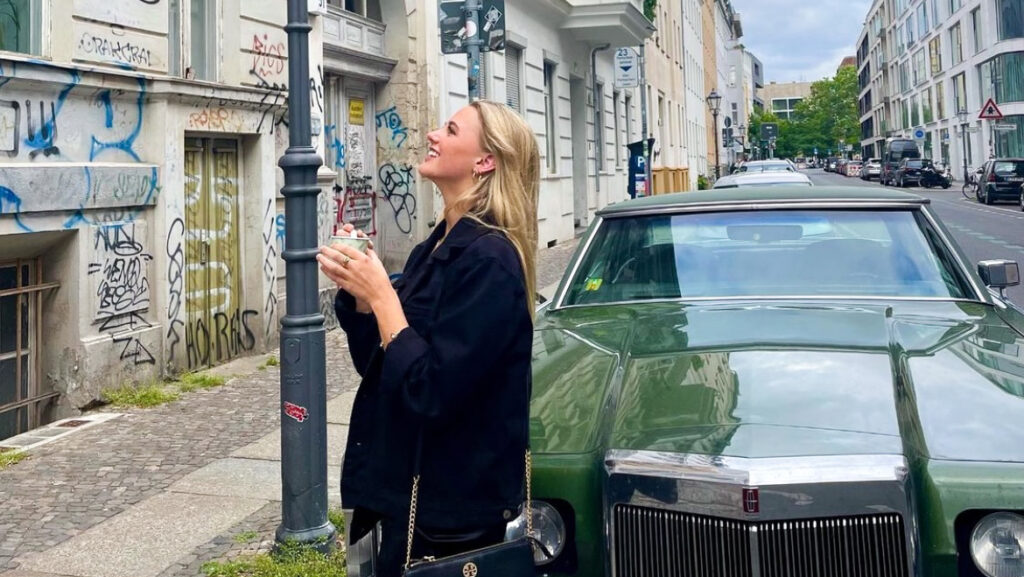 Ashton Benn posing for a photo in Berlin, Germany