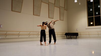 Valerie Chen and Diego Lopez dancing in a USC Kaufman studio.