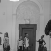 Kyle Abraham stands at the front of a classroom full of students