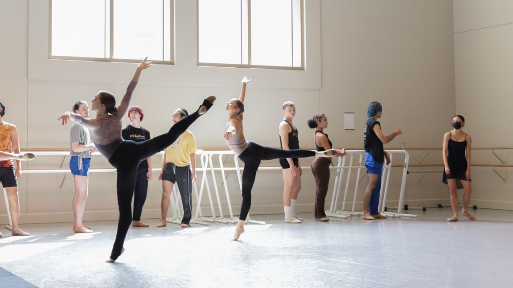 ballet dancers going across the floor