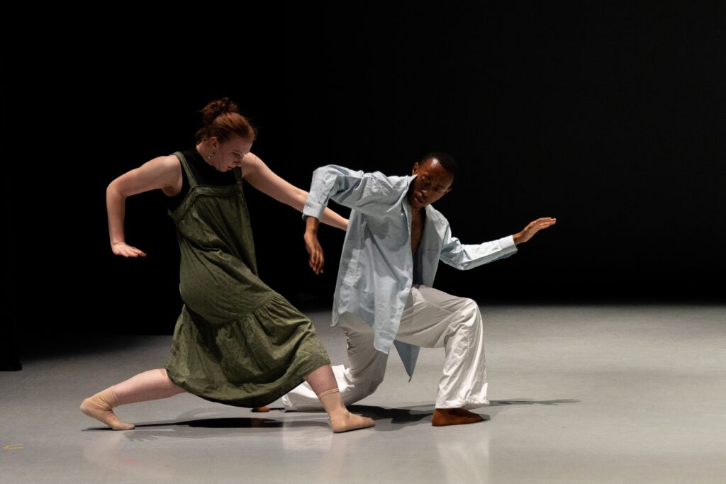 Shea Hancock (BFA '25) and Xavier Williams (BFA '25) dancing together at Choreographers and Composers 2023