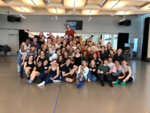 Jonacy Montero (BFA '24) and other students pose for a photograph at the RUBBERBAND Summer Intensive