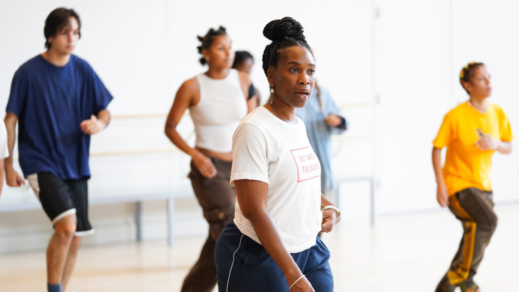 Photo of USC Kaufman professor Nina Flagg in a recent rehearsal for her work "L/Anding".